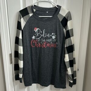 Brand new women’s holiday, long sleeve shirt, size medium.